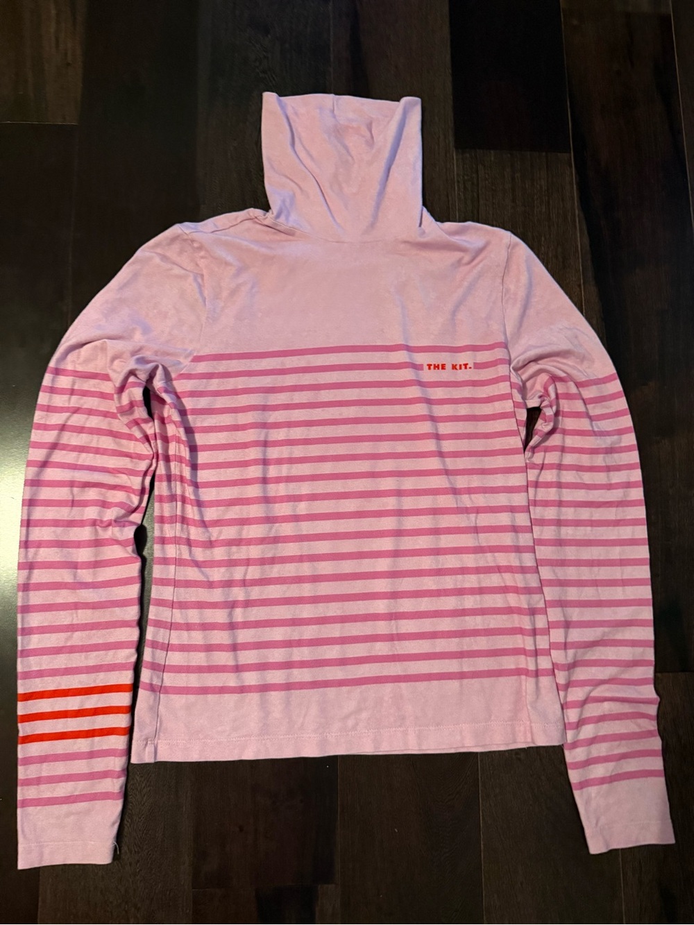 The Kit  pink turtleneck